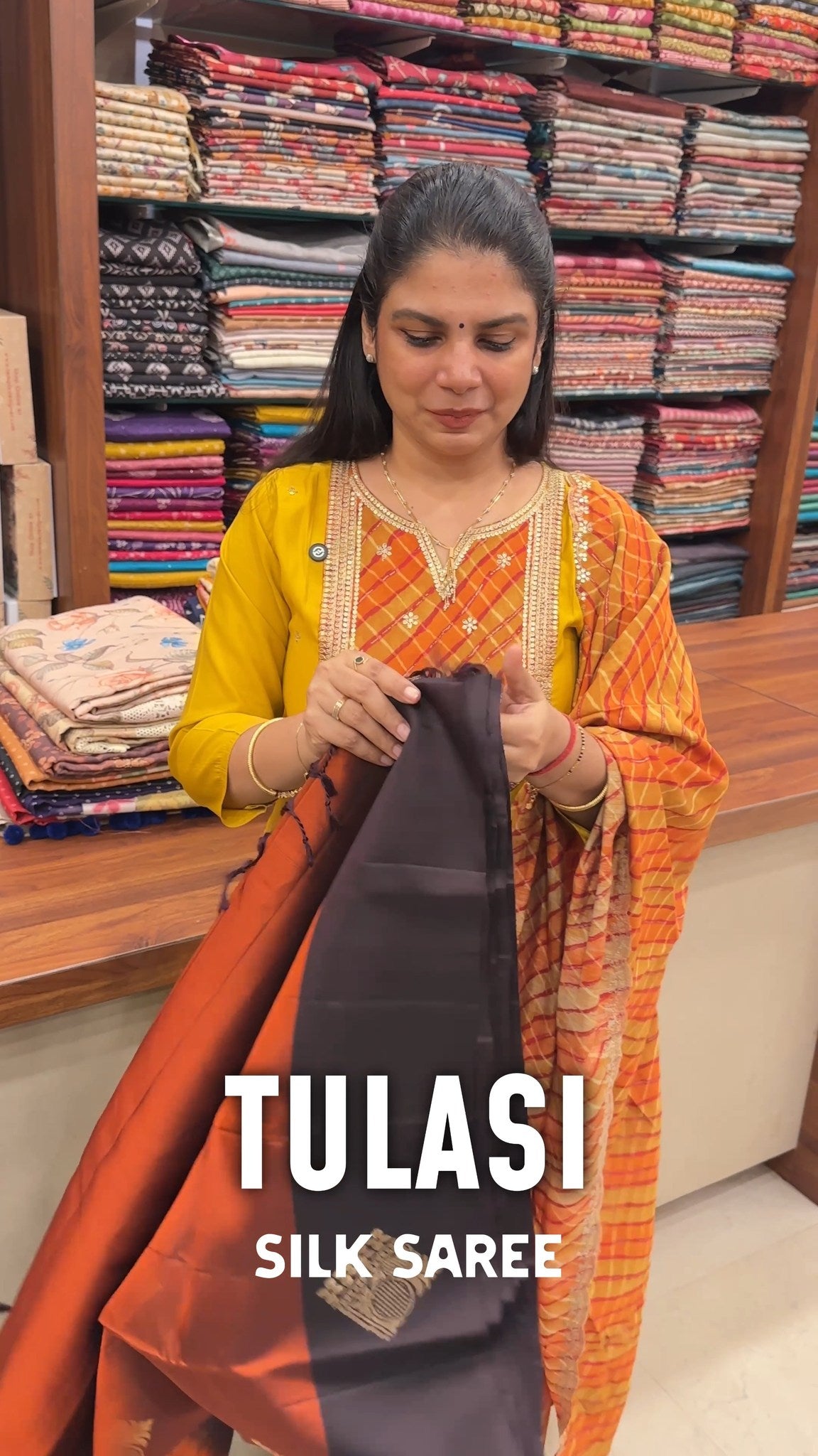 Elegant Tulasi silk saree with a soft shine and graceful drape per...