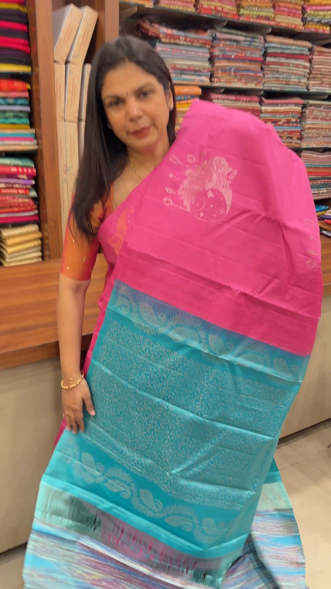 This Pure Soft Silk Saree offers a feather-light drape and a natura...