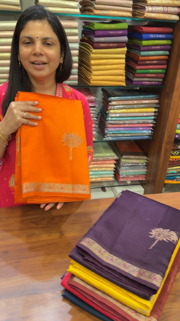 This saree features elegant woven stripes that highlight the beauty...