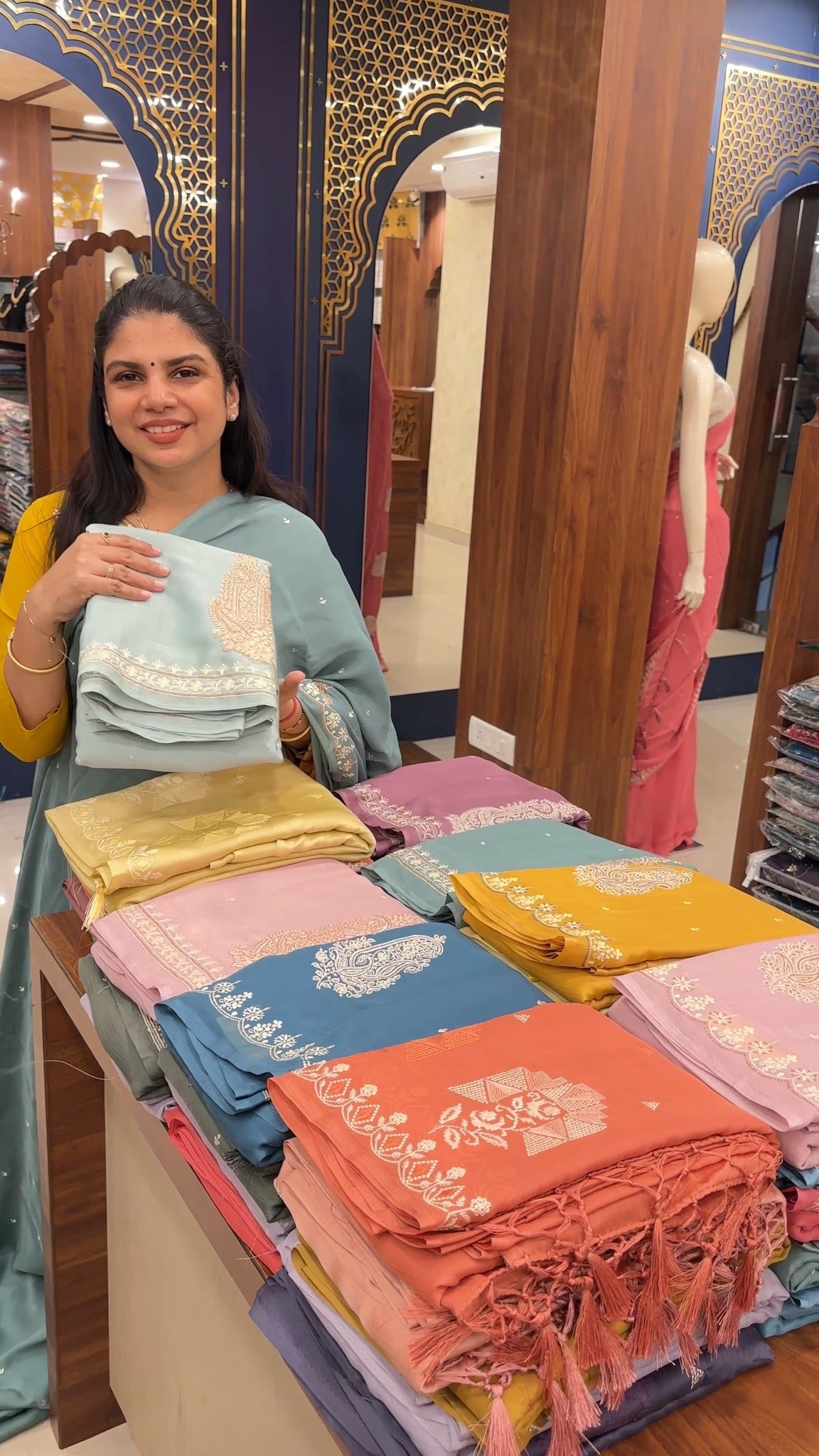 A crushed georgette saree featuring lightweight, flowy fabric with ...