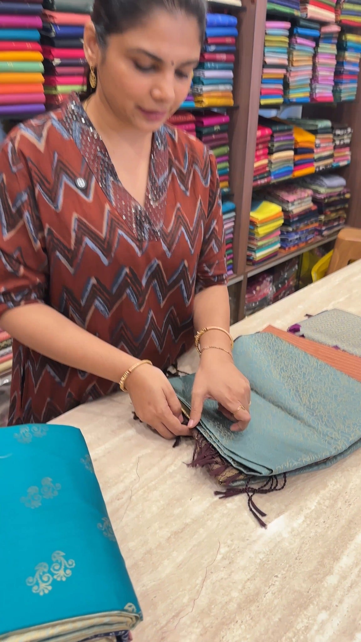 Elegant semi-soft silk saree with traditional motifs and a contrast...