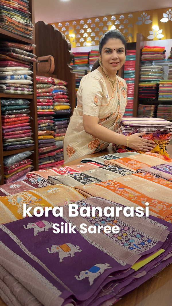 Saree Name -Kora Banarasi Silk Saree

Blouse - Self Colour Blouse

...